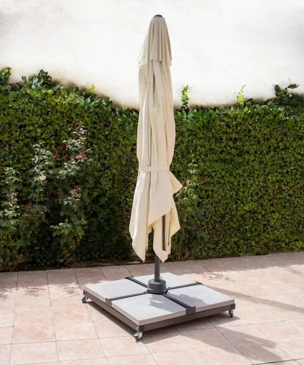 Base de parasol con ruedas de aluminio y losas cemento Galeón